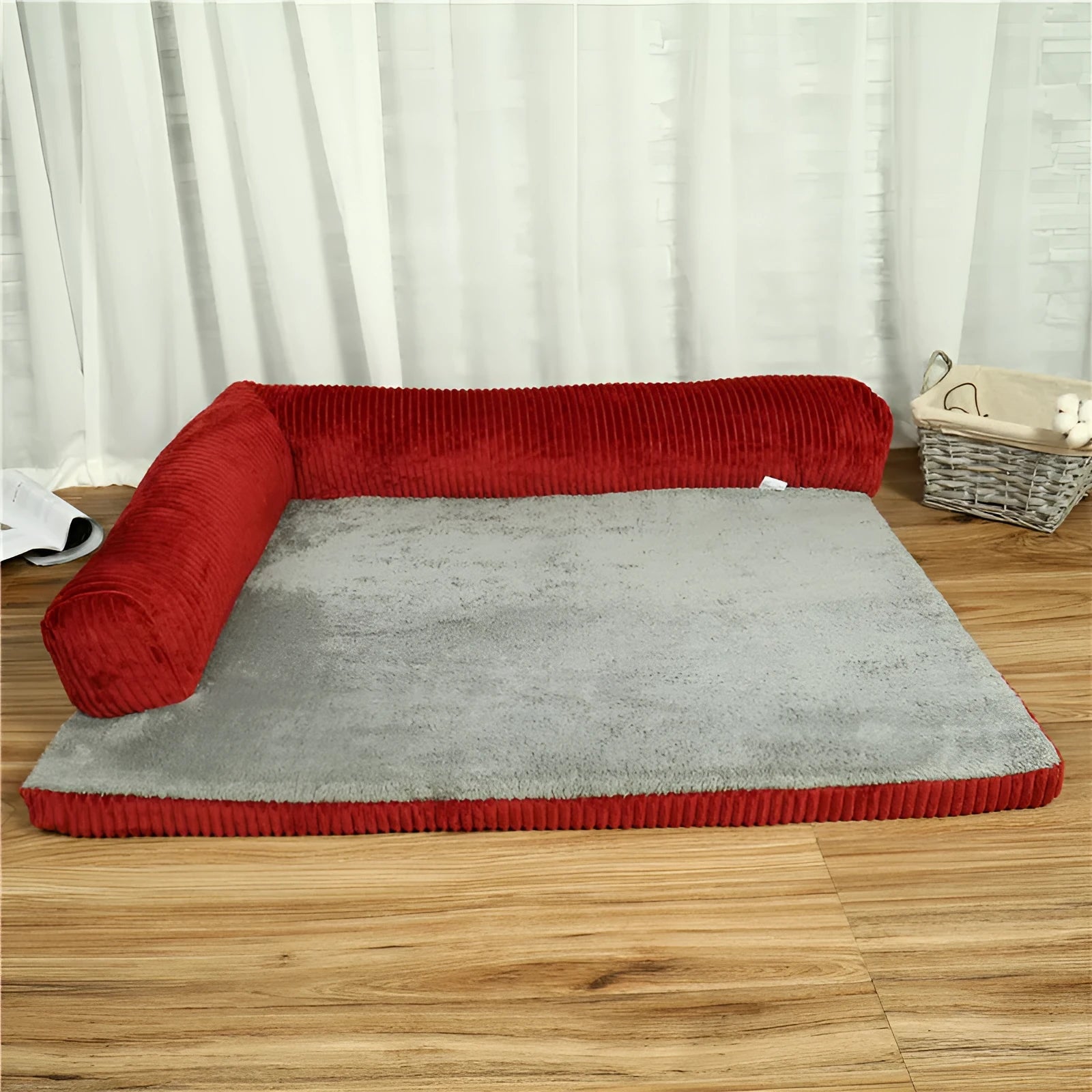Corduroy pet sofa dog bed with bolster in grey colour, showing non-slip base and high-density sponge padding