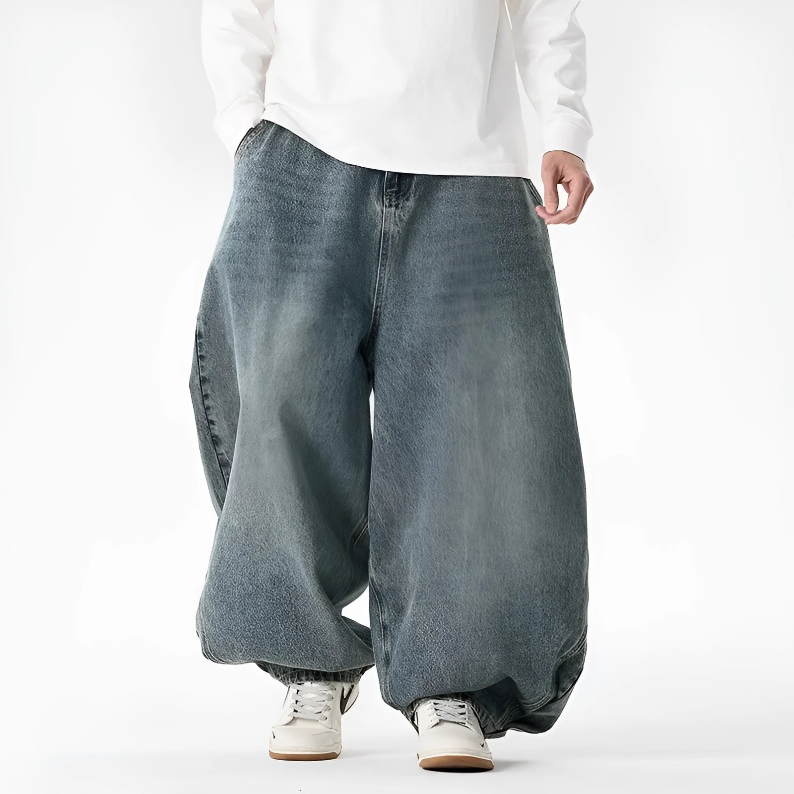 Men's plus size baggy jeans in dark blue denim with a straight leg opening and low waist.