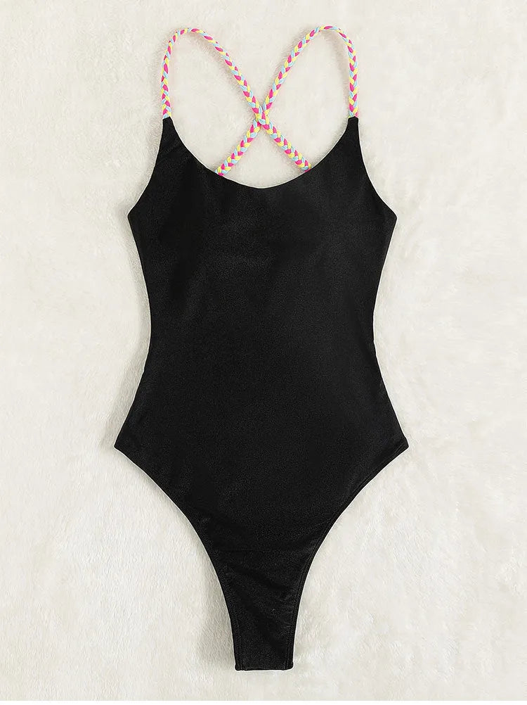 Black backless one-piece swimsuit for women with sleeveless design and solid colour
