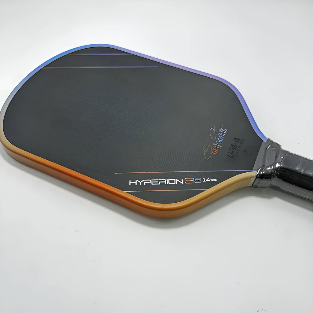 Aurora Hyperion 3s multi-colour matte pickleball racket showing carbon fibre construction.