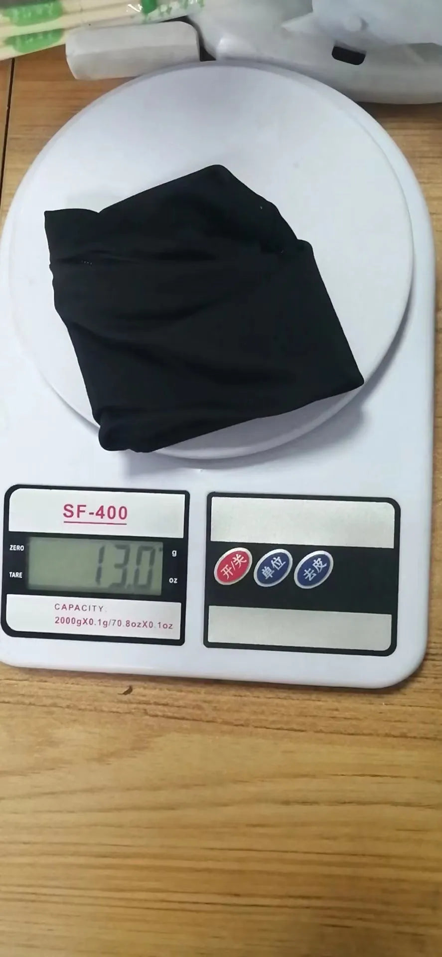 Black wrist bag armband sleeve for mobile phone, shown with dimensions 10cm by 10.5cm.