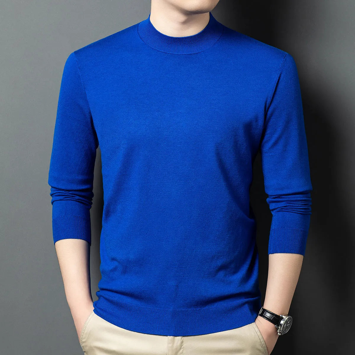 Men's round neck wool and mulberry silk long sleeve pullover sweater on a hanger.