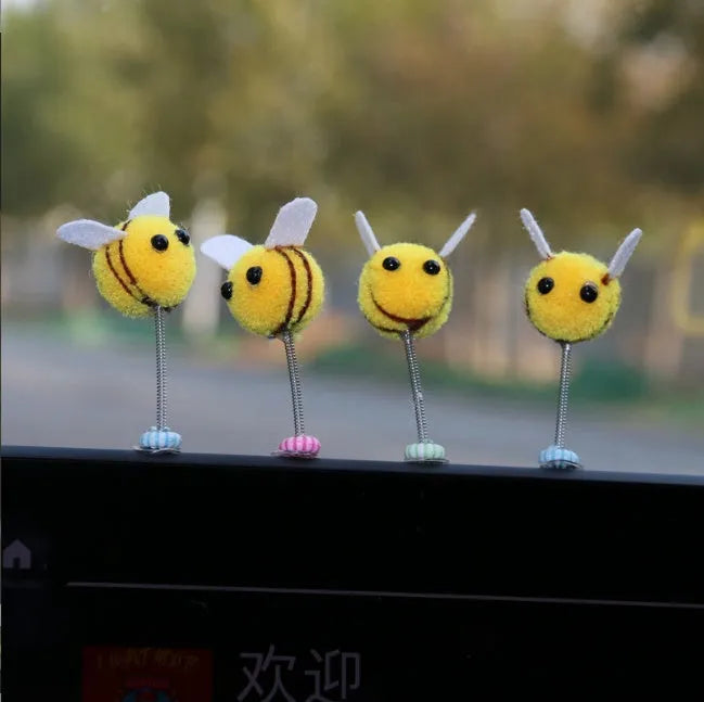 Swing Spring Bee car decoration ornament with cartoon design measuring 3x3 cm