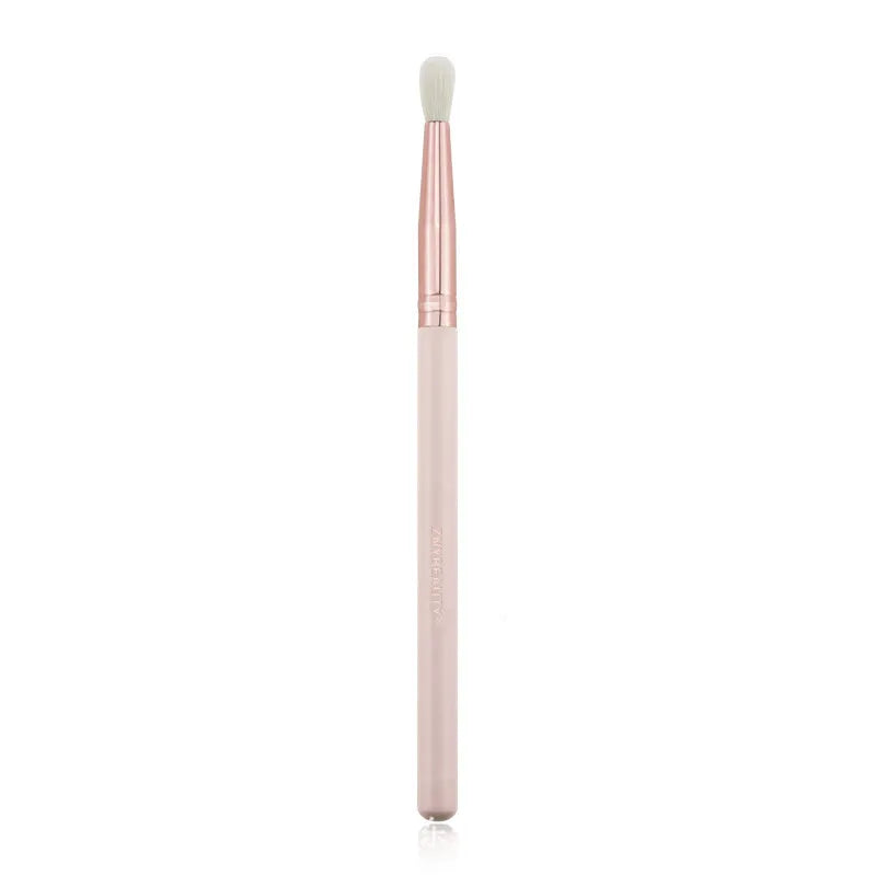 26-piece pink makeup brush set with wooden handles and a grey PU storage case, arranged open.