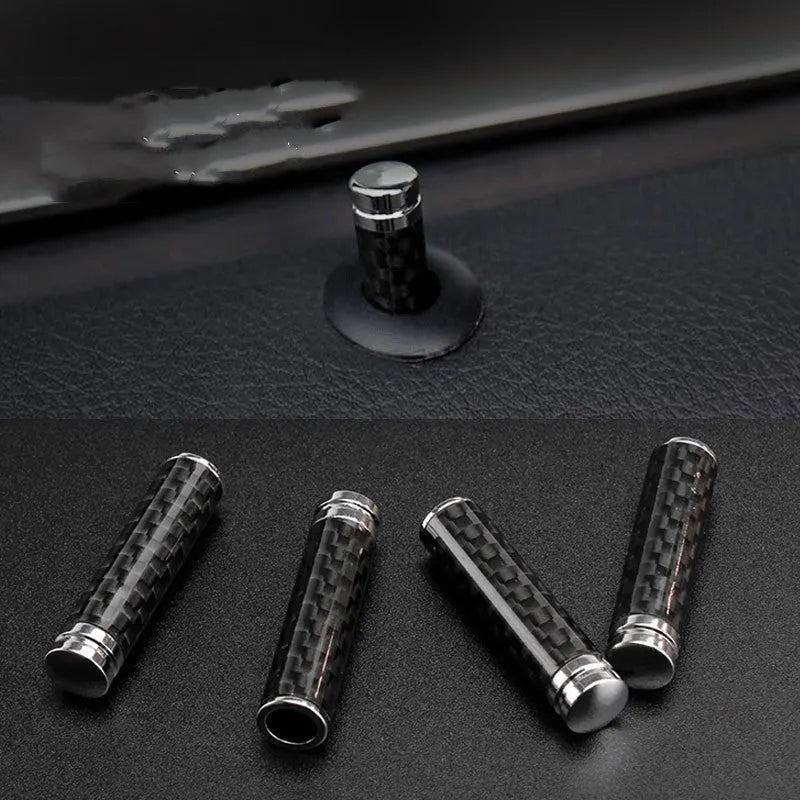 Set of four carbon fibre car door handle covers for universal fit installation.