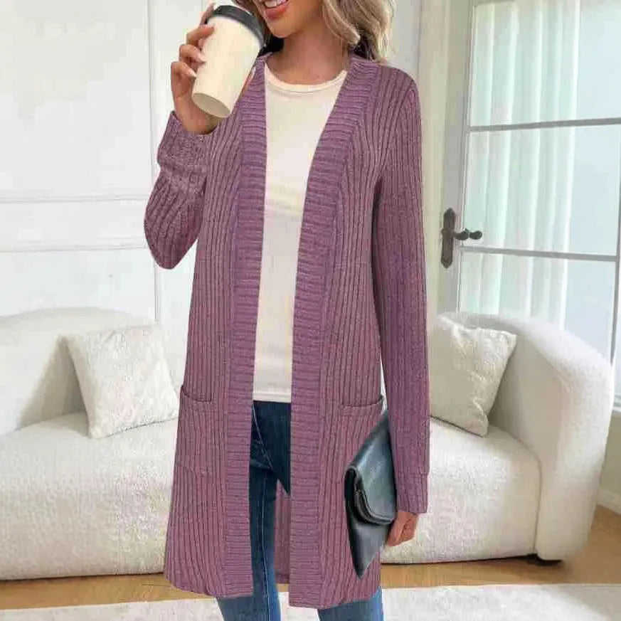A loose-fit long sleeve knitted cardigan jacket in grey with front pockets.