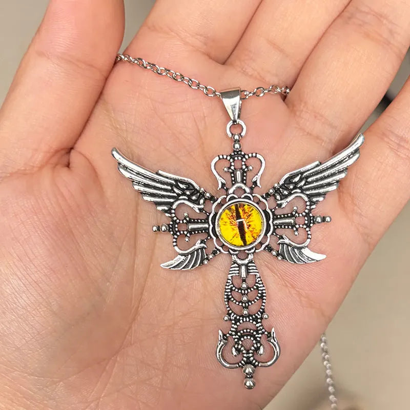 Geometric devil wings and cross alloy pendant necklace on a chain in blue colour.