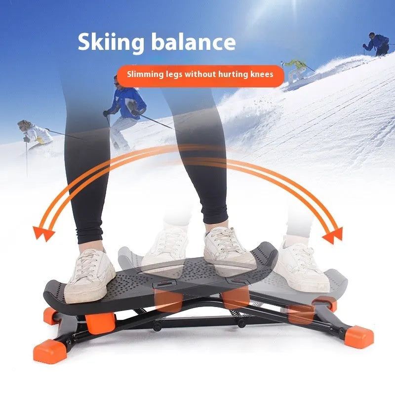 Black mini fitness skiing machine with elastic hand straps showing compact 77cm length design