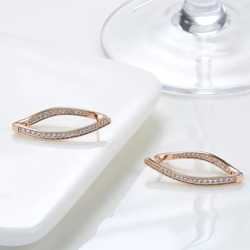 Geometric zircon drop earrings in H0493 colour with copper construction showing structured design lines
