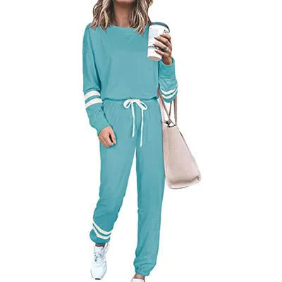 Women's plus size casual suit set in loose-fitting design with long sleeves, available in seven solid colours