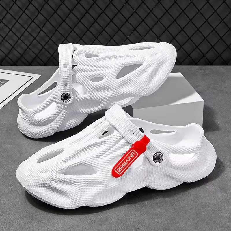 Pair of solid colour closed-toe EVA foam slippers on a neutral background, showing the frosted finish and thickened sole.