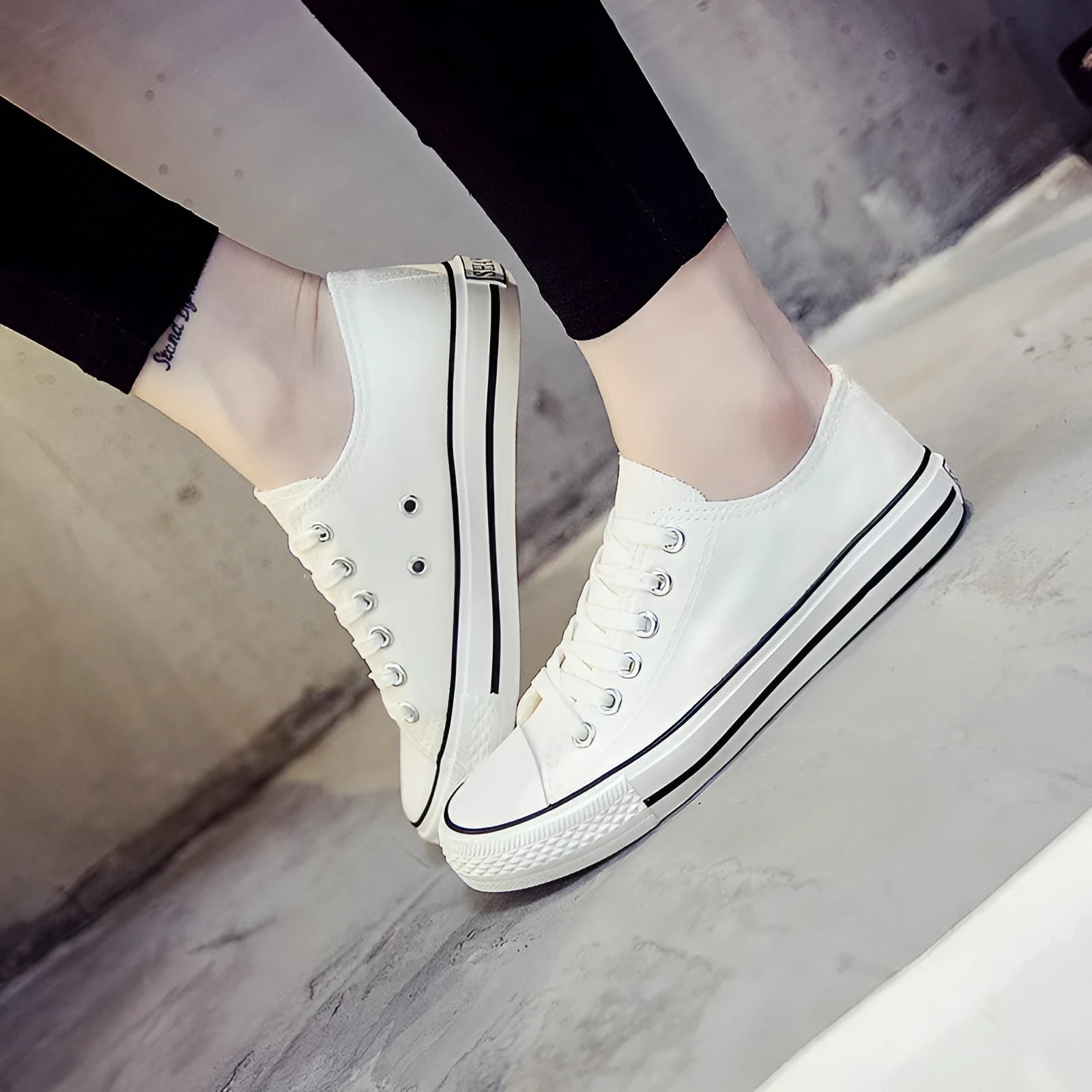 Women's solid colour canvas casual shoes in black, white black, white red, and all black.