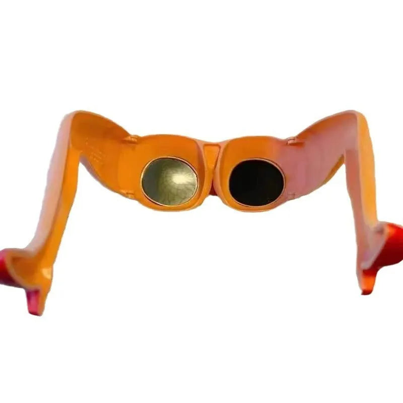 Orange plastic novelty sunglasses with a leg hip frame design on a white background.