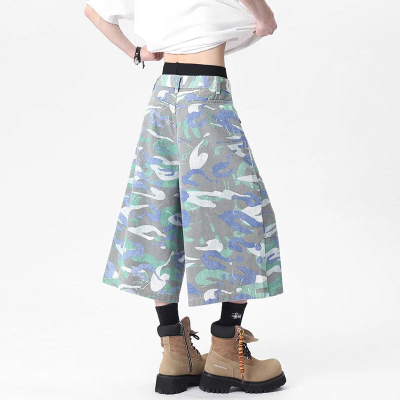 Denim camouflage cropped workwear trousers with straight leg cut and zipper fly closure