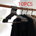 Elegant black non-slip anti-rust clothes hanger with modern minimalist design for trousers and ties.