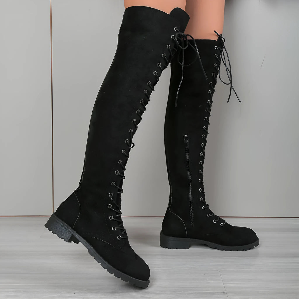 Women's black lace-up over the knee boots with round toe and stitching detail on a white background