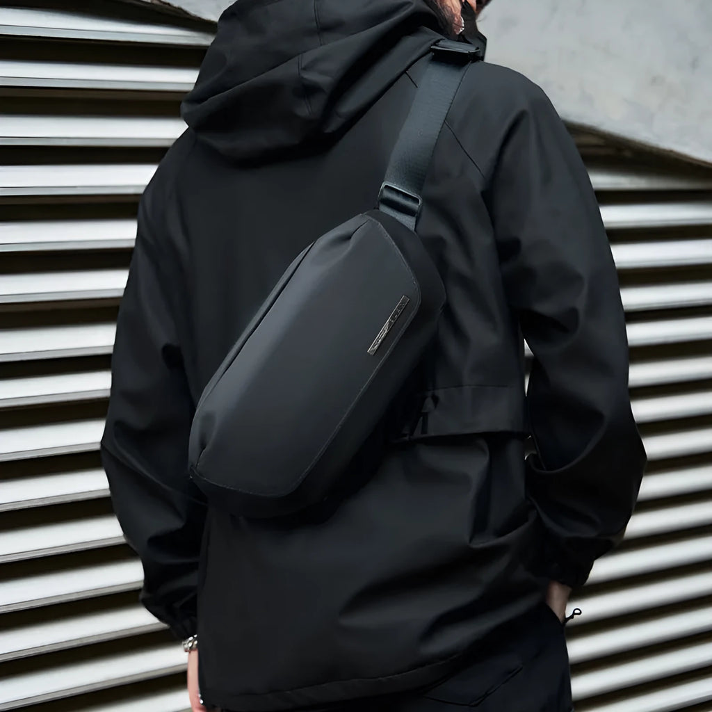Black men's messenger bag made from Oxford cloth with one-shoulder cross-body design