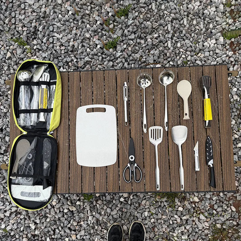 Portable picnic kitchenware storage bag containing stainless steel cutlery set for twelve persons