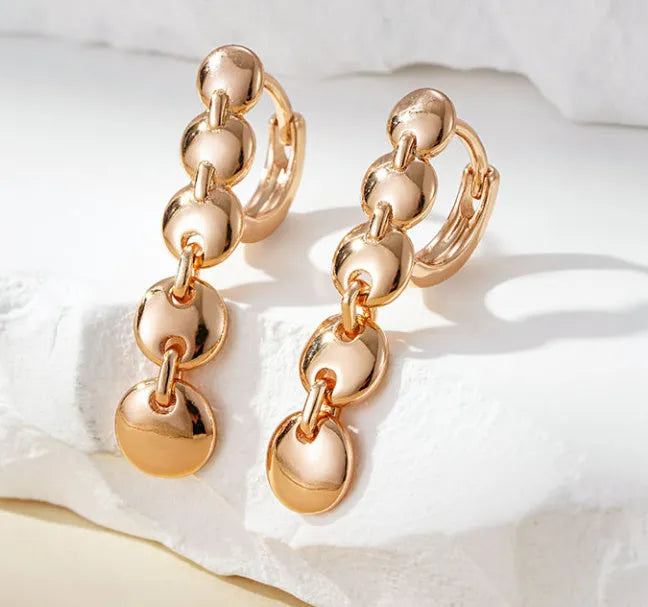 Gold retro woven copper circle earrings with round shape and long drop design