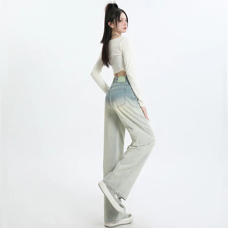 Gradient blue women's straight-leg wide-cut denim trousers laid flat