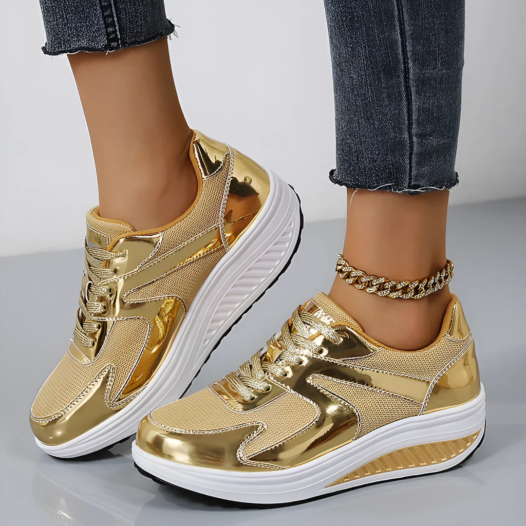 Women's mesh platform shoes in gold colour with cross strap detailing and waterproof mid-heel