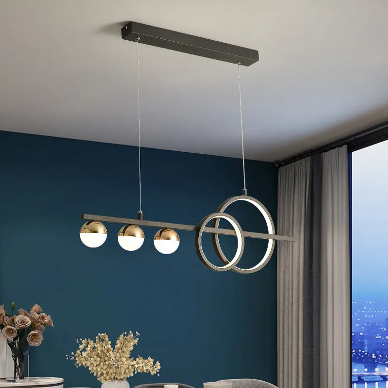 Rectangular black aluminium LED ceiling light with remote control on a white ceiling