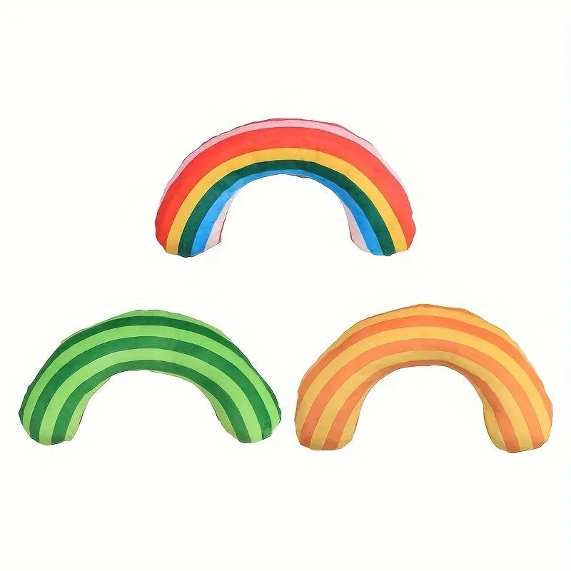 Green, rainbow, and yellow striped cat pillow and noise toy set on a white background