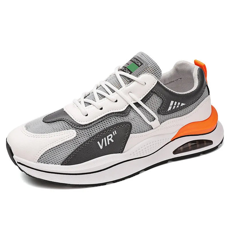 Men's gray mesh running shoes with round toe and middle top height on white background