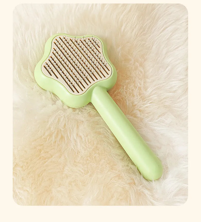 Self-cleaning cat grooming comb with stainless steel needle teeth in green colour option