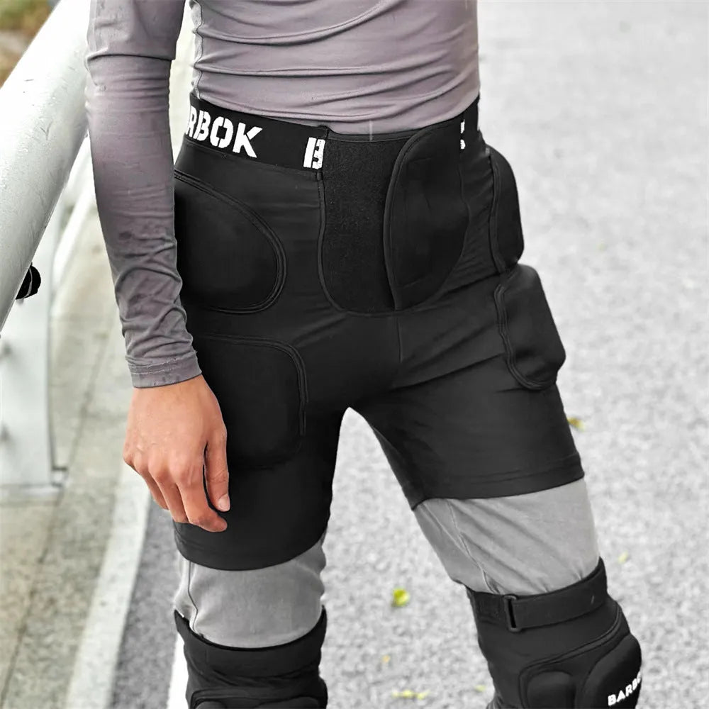 Black protective hip pad made of spandex with NBR foam padding for roller skating and skateboarding.