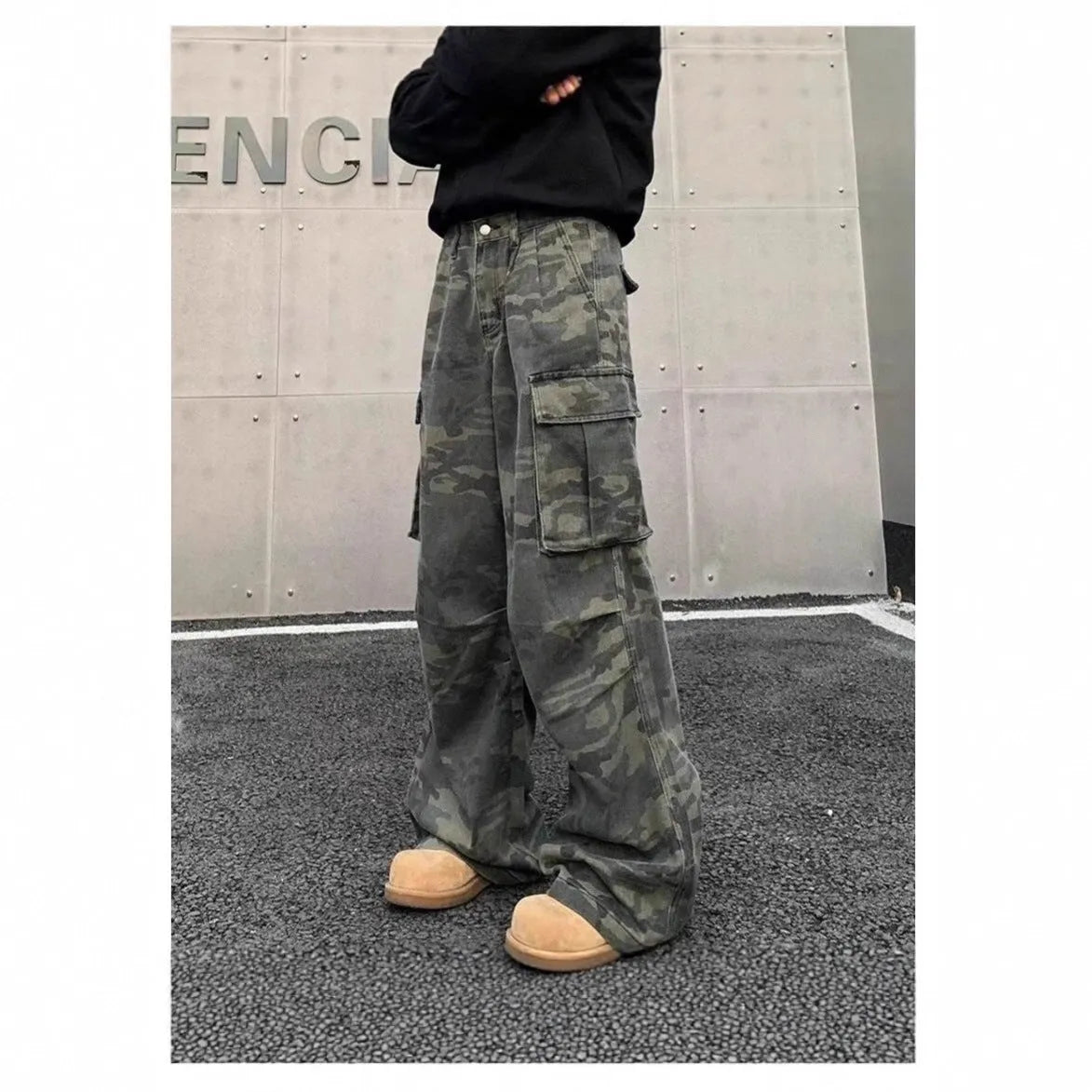 Cotton blend cargo pants with washed camouflage print and multiple pockets