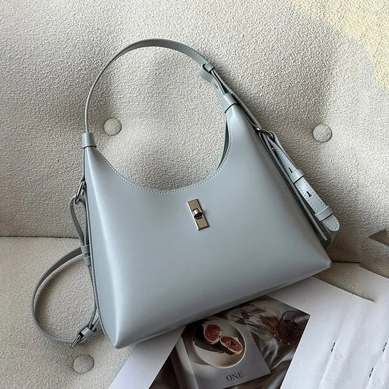 Genuine leather crossbody shoulder bag in dumpling shape with organised compartments