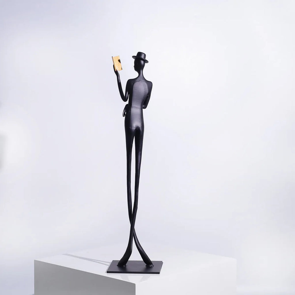 Black cast aluminium reading woman desktop sculpture modern minimalist decor