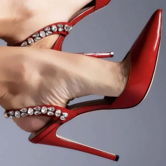Women's black patent leather pointed toe high heel sandals with rhinestone detail on the side.