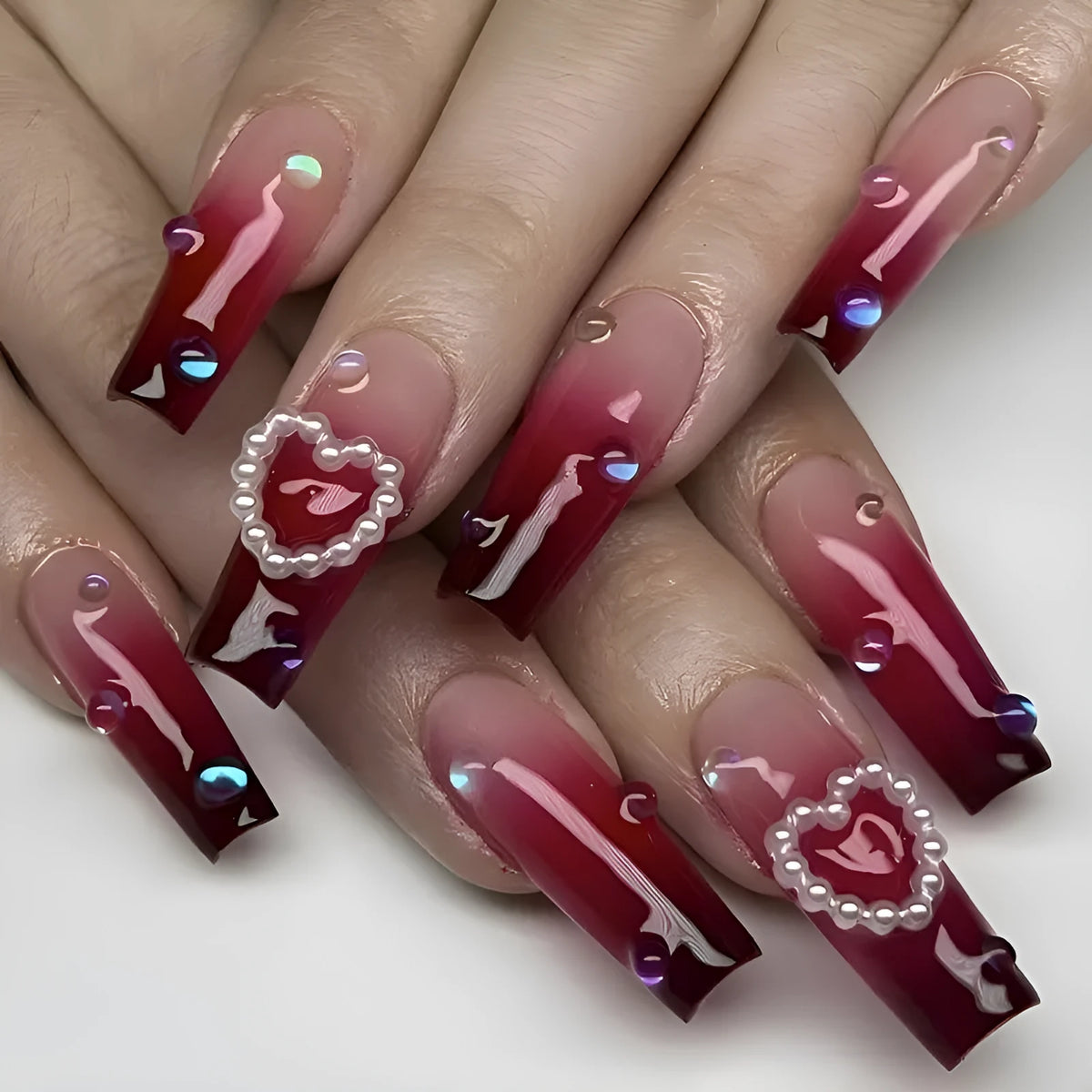 Wine red gradient plaid pattern fake nail tips with pearl hearts in long ballet style