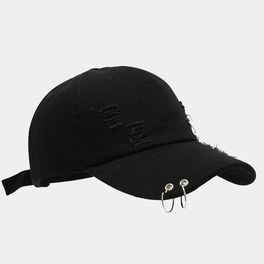 Men's adjustable denim peaked cap in black, shown from a side angle.