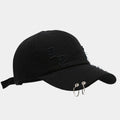 Men's adjustable denim peaked cap in black, shown from a side angle.