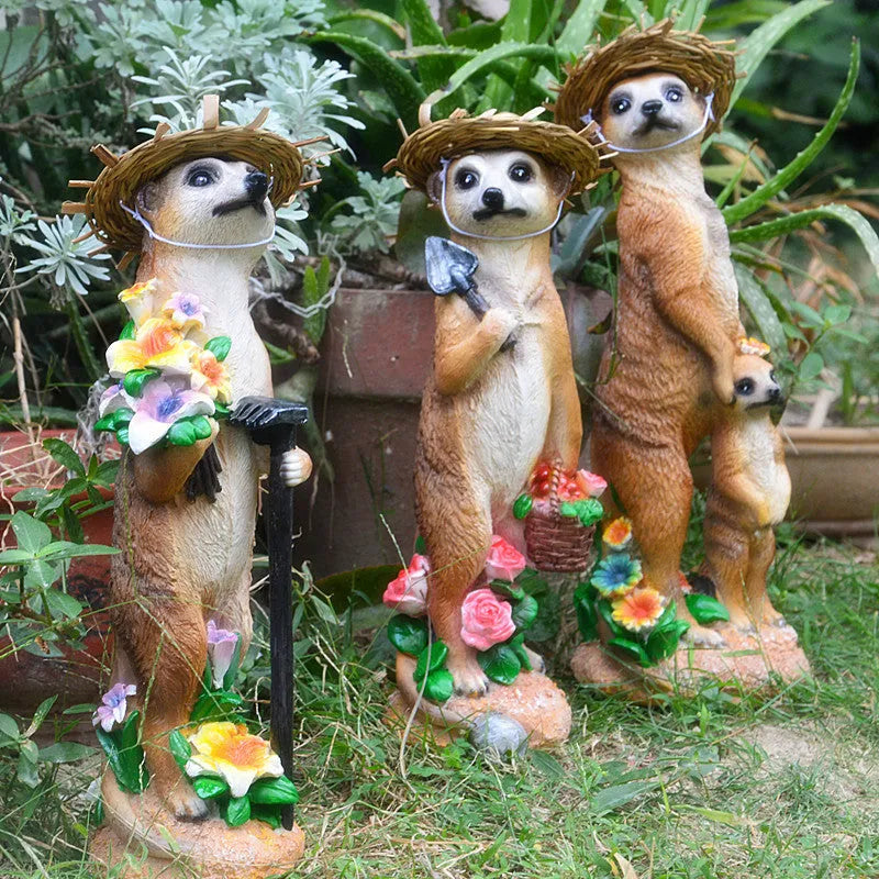 Straw hat mongoose garden ornaments in resin with rake and shovel designs