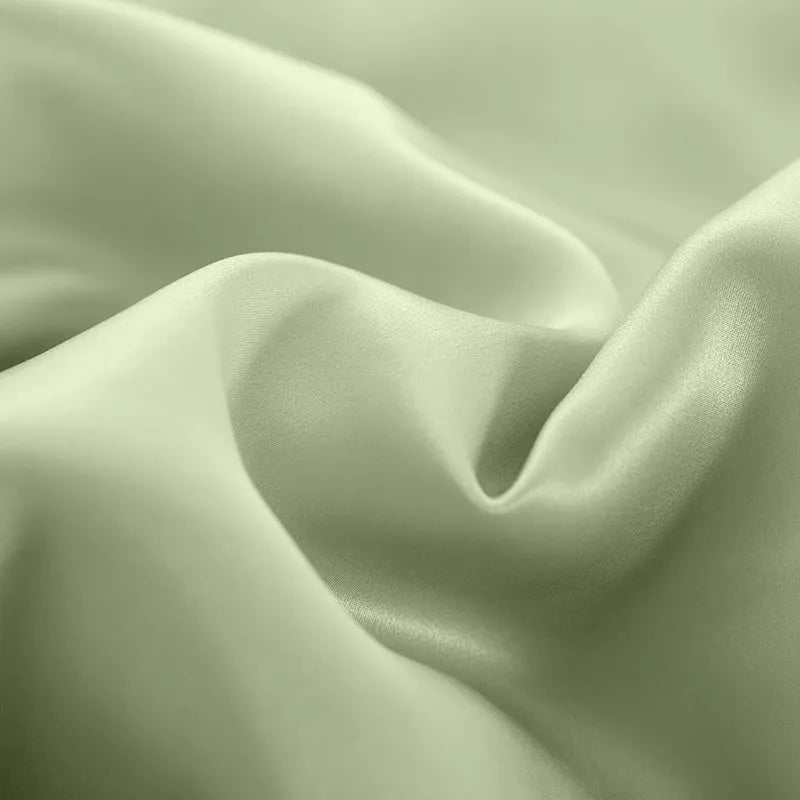 Solid colour silk duvet cover in lotus pink, pea green, bright brown, mysterious purple, white, and silver blue.
