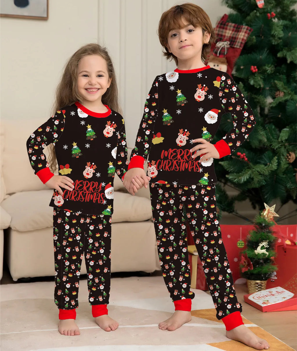 Matching family Christmas pajamas set for parents, children, baby and dog on sofa