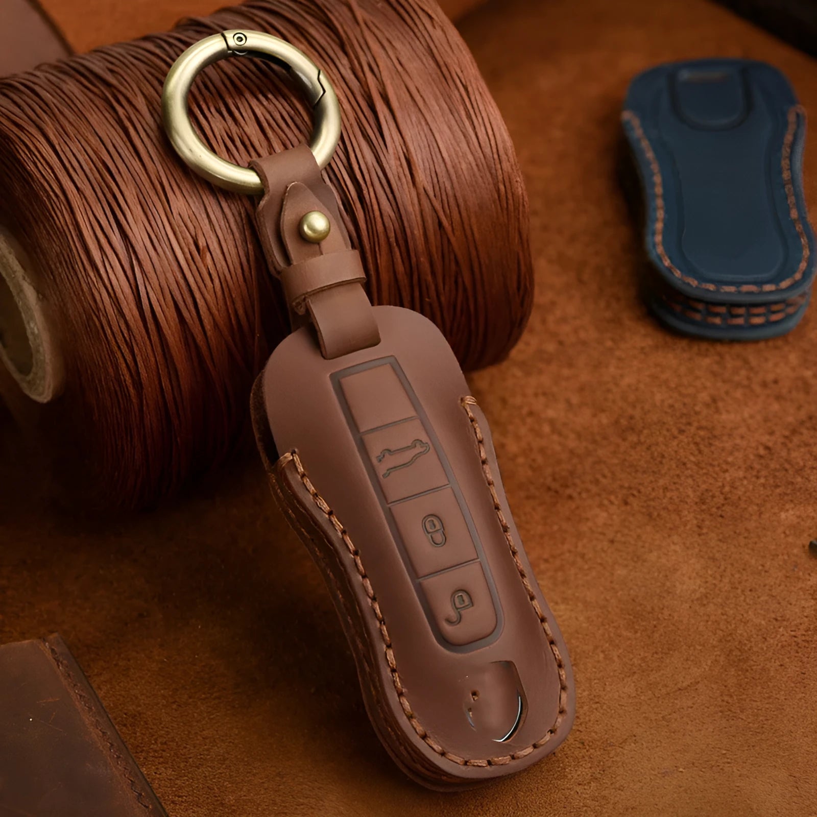 Genuine leather Porsche key case with retro bag buckle in blue and brown colour options
