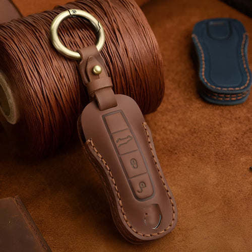 Genuine leather Porsche key case with retro bag buckle in blue and brown colour options