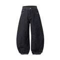 Men's wide-leg denim trousers in original cow colour, showing relaxed fit and mid-waist design.
