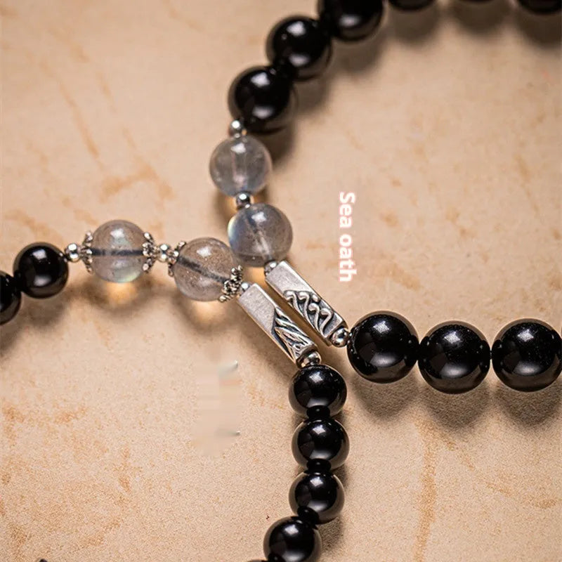 Black obsidian bead bracelets showing 8mm and 10mm sizes for couples in national style