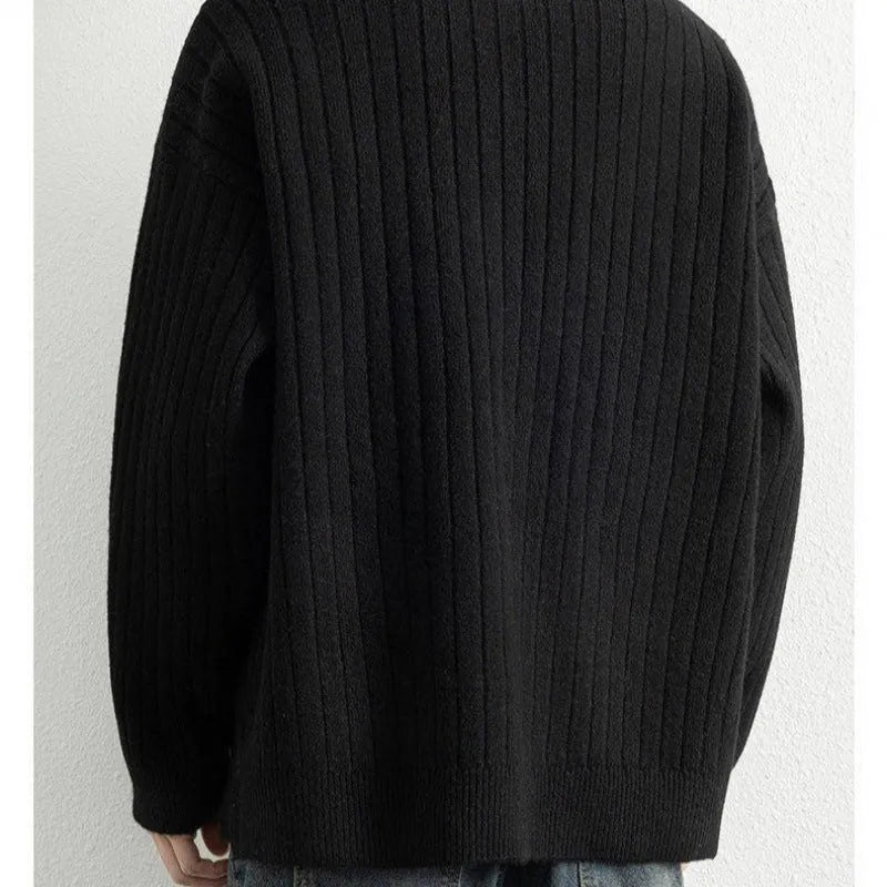 Men's grey half zip sweater with loose fit and textured knitted design