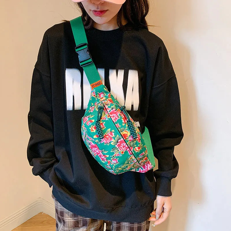 Women's western style waist bag with large floral decoration and contrast stitching