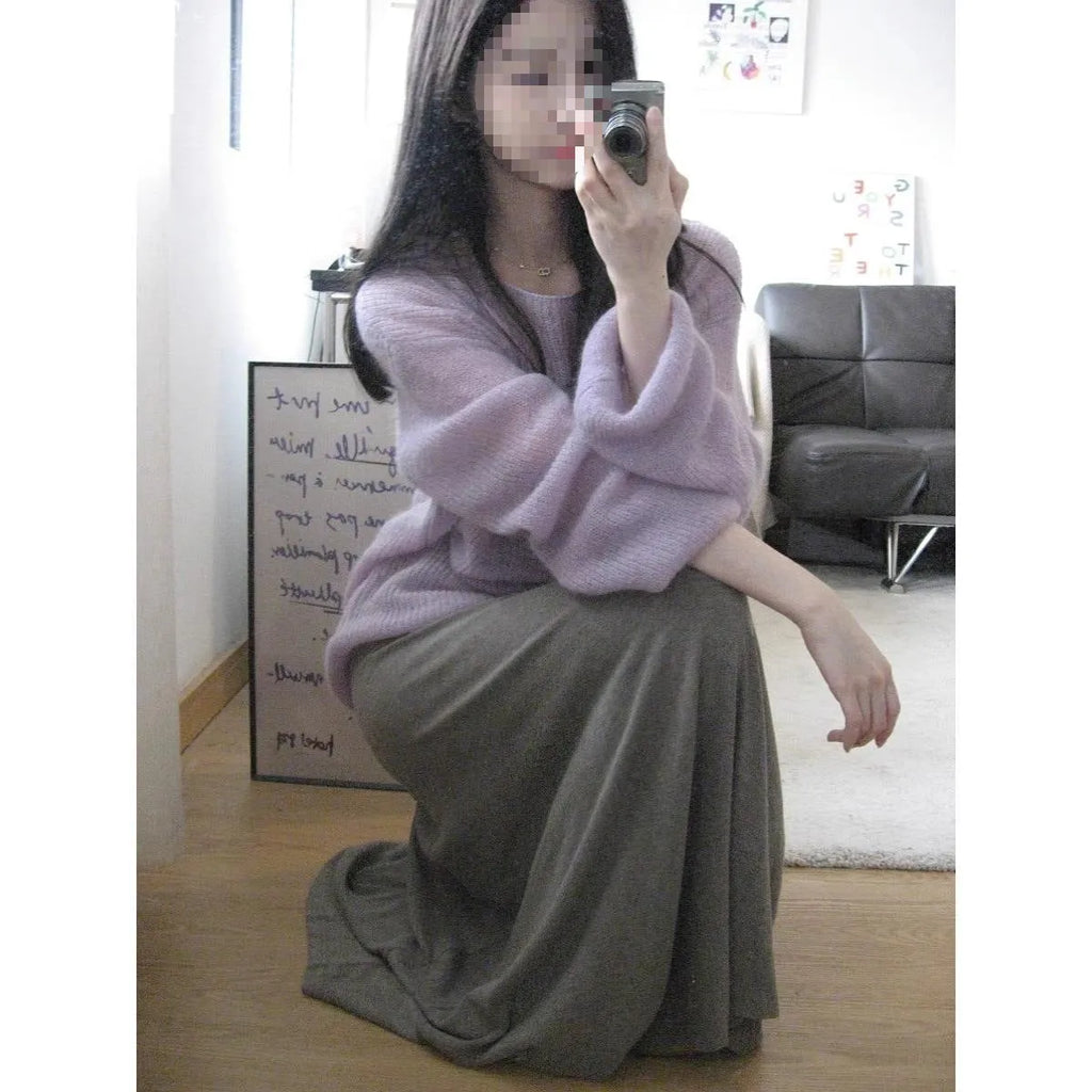 Purple sleeveless blouse with round neck and hollow out detailing on lightweight ice silk fabric
