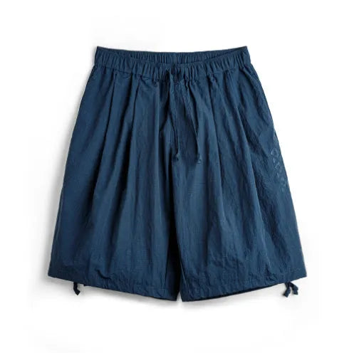 Men's Prussian blue embroidered nylon beach shorts with elastic waistband