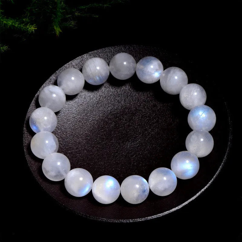 White moonstone bracelet with blue moonlight colouration in round polished beads