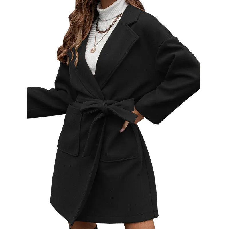 Minimalist long sleeve lapel button coat with a split belt in a loose Japanese Korean style